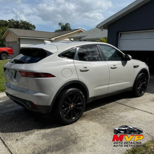 White SUV with glossy finish after exterior auto detailing and paint protection in Clearwater FL